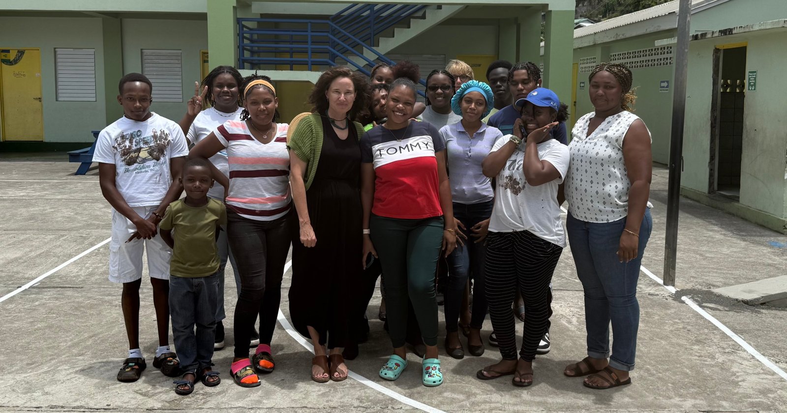 SVGCC students with their professors in a schoolyard in St. Vincent